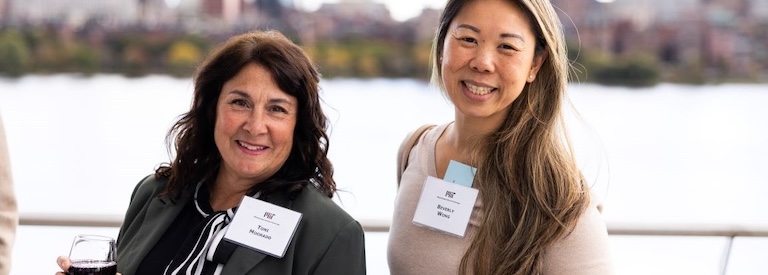 Two ladies enjoying a moment on the Samberg deck.