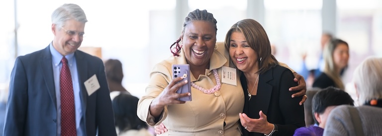 New QCC member takes a selfie with Ramona Allen, VP of HR