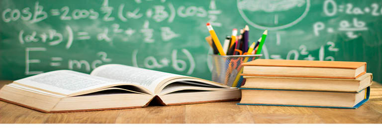 Photo of books and chalkboard